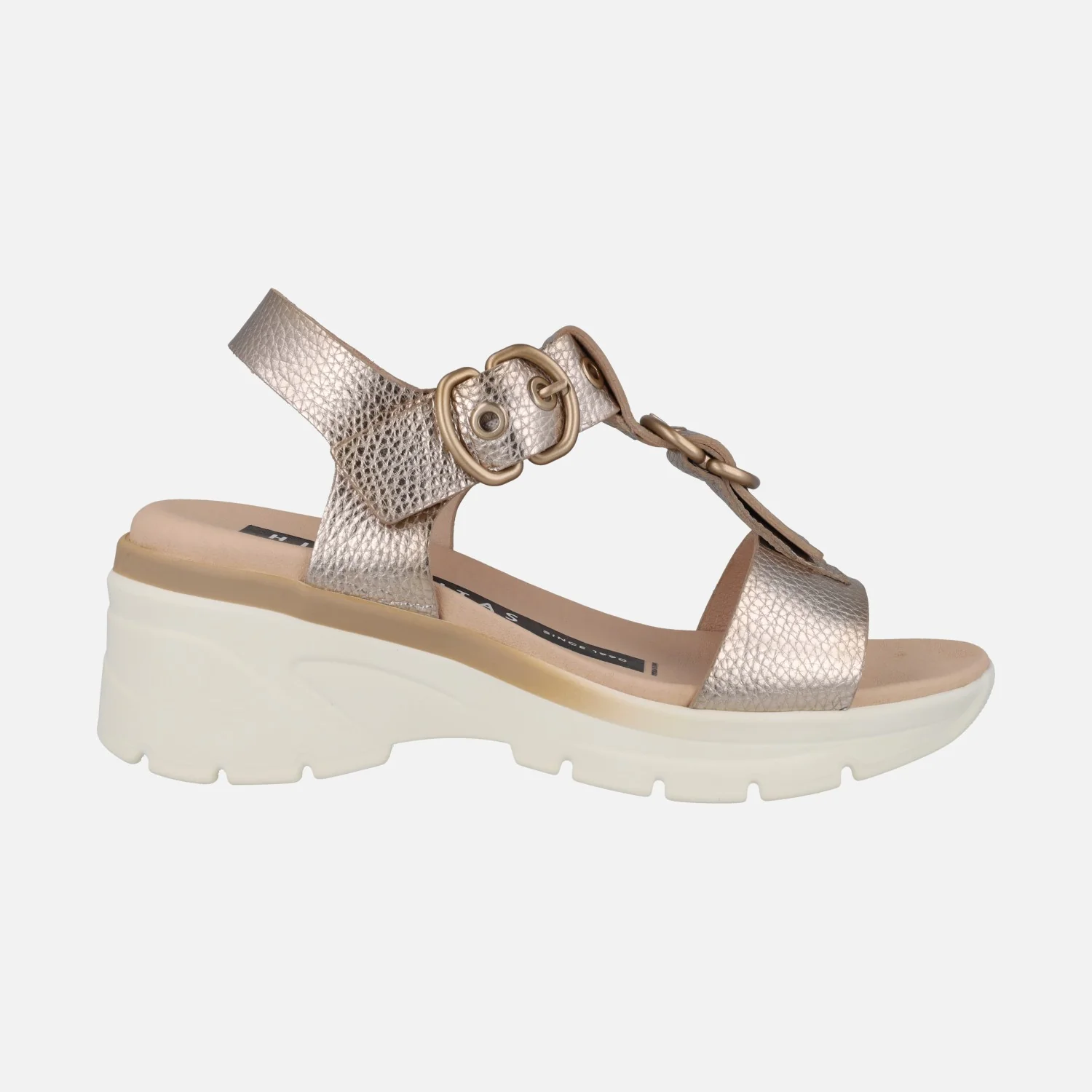 Sandalias doradas de piel con adorno hebillas y cuña media