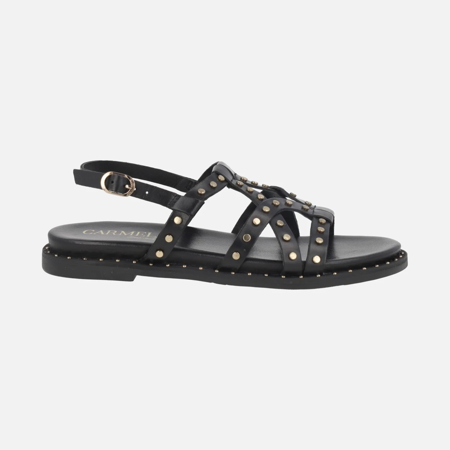 Sandalias planas de piel con tachas doradas