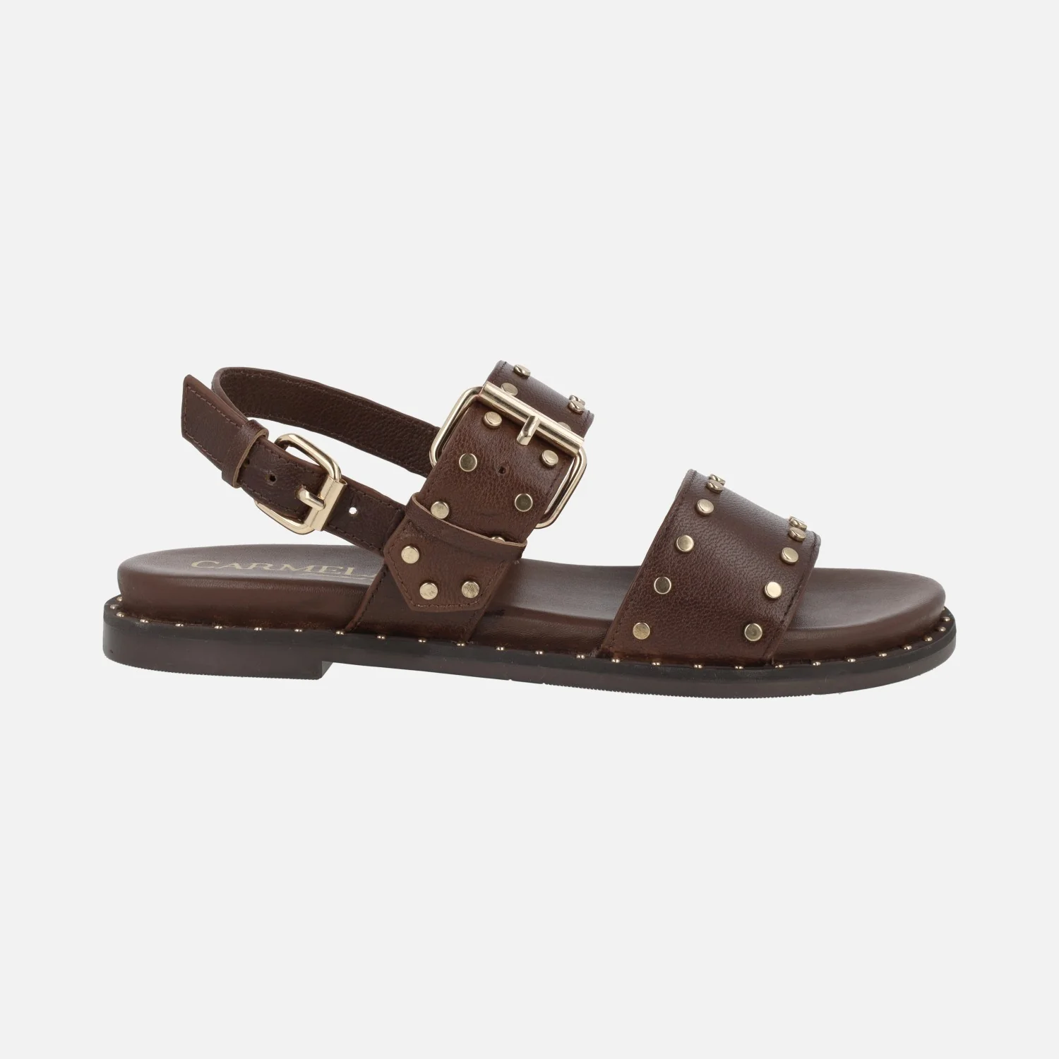 Sandalias planas de piel con tachas y hebillas